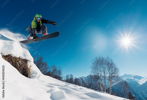 Picture of snowboarder is jumping with snowboard